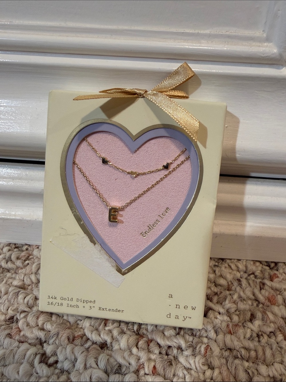 a new day Gold Layered Initial E Necklace with Heart Accents
